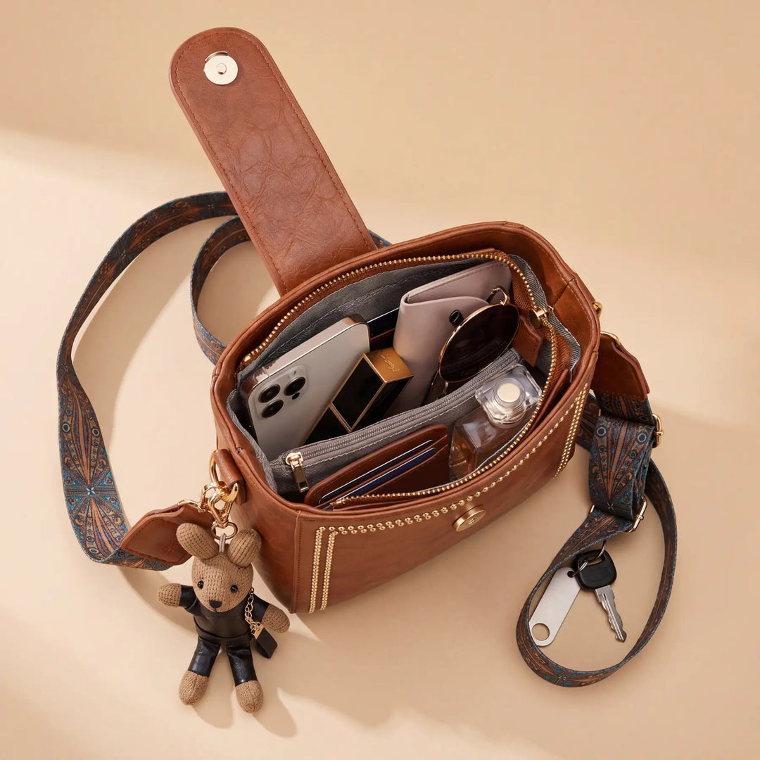 Bolso tipo Satchel + Muñeco Arion de obsequio
