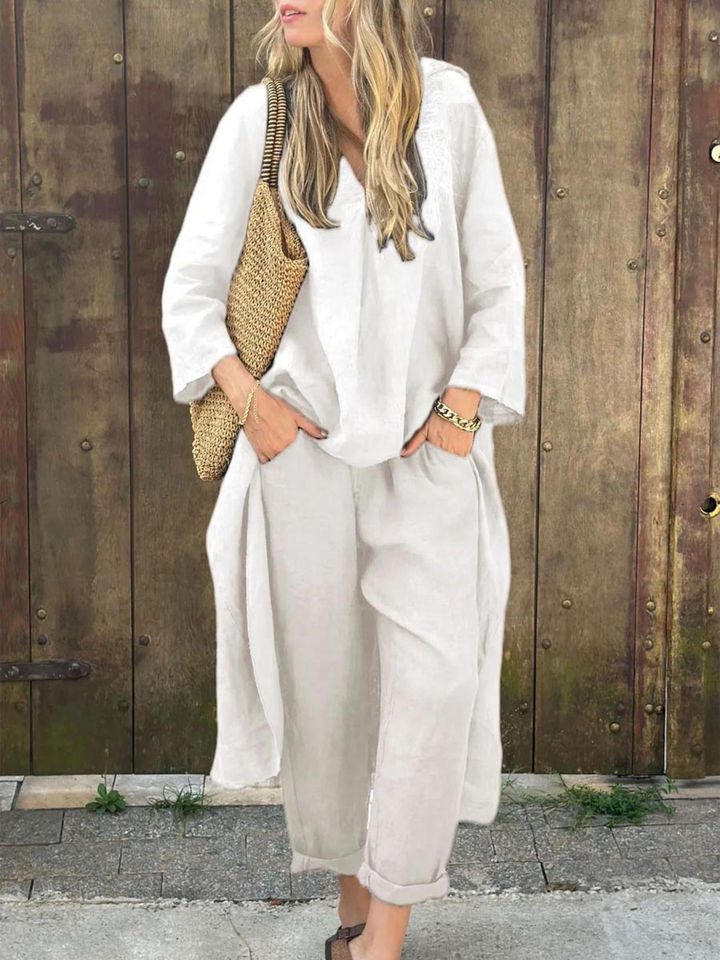 "Conjunto de Top de Cuello en V Lila y Pantalones de Pierna Ancha" (The title is already in Spanish. If you would like a different variation or style, please let me know!)