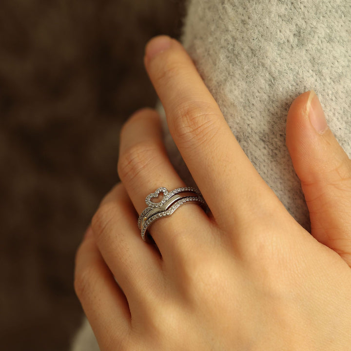 "Anillos Apilables Shining Love Wish Bone" se puede traducir como "Anillos Apilables Shining Love Hueso de Deseo".