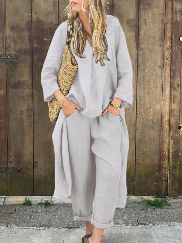 "Conjunto de Top de Cuello en V Lila y Pantalones de Pierna Ancha" (The title is already in Spanish. If you would like a different variation or style, please let me know!)