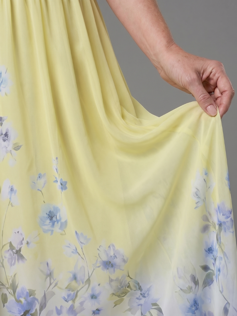 Clarissa | Vestido midi sin mangas con escote en V y dobladillo floral suave