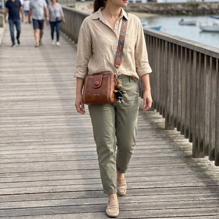 Bolso tipo Satchel + Muñeco Arion de obsequio