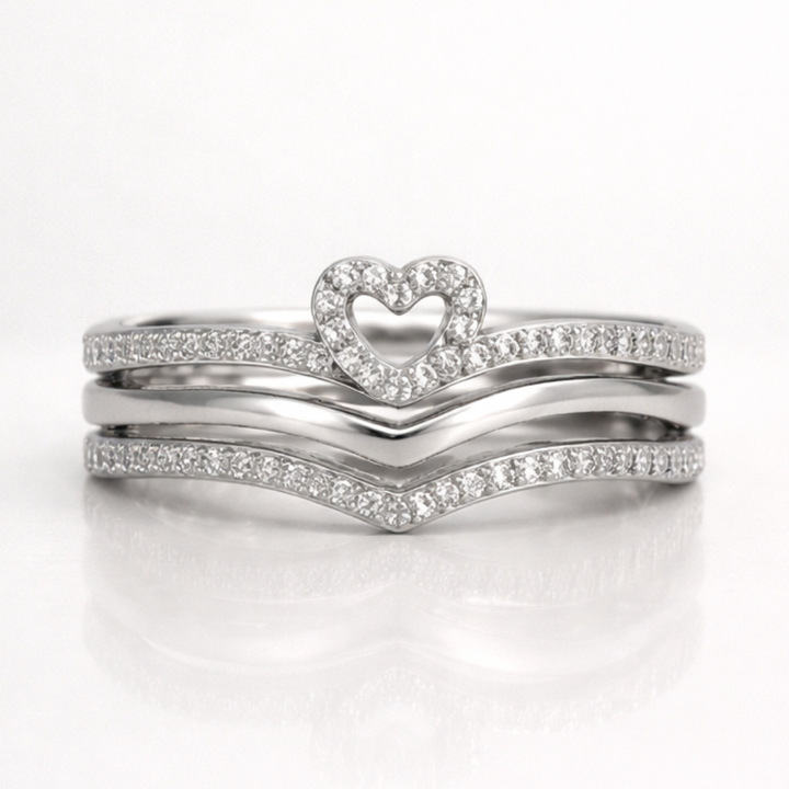 "Anillos Apilables Shining Love Wish Bone" se puede traducir como "Anillos Apilables Shining Love Hueso de Deseo".