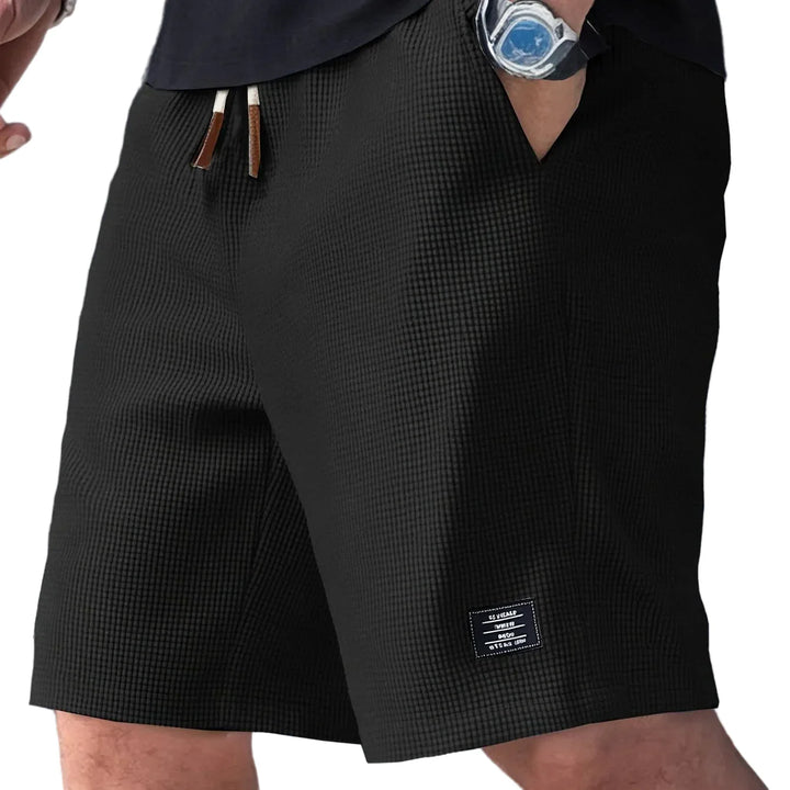 ERMES | PANTALONES CORTOS DE ESTILO