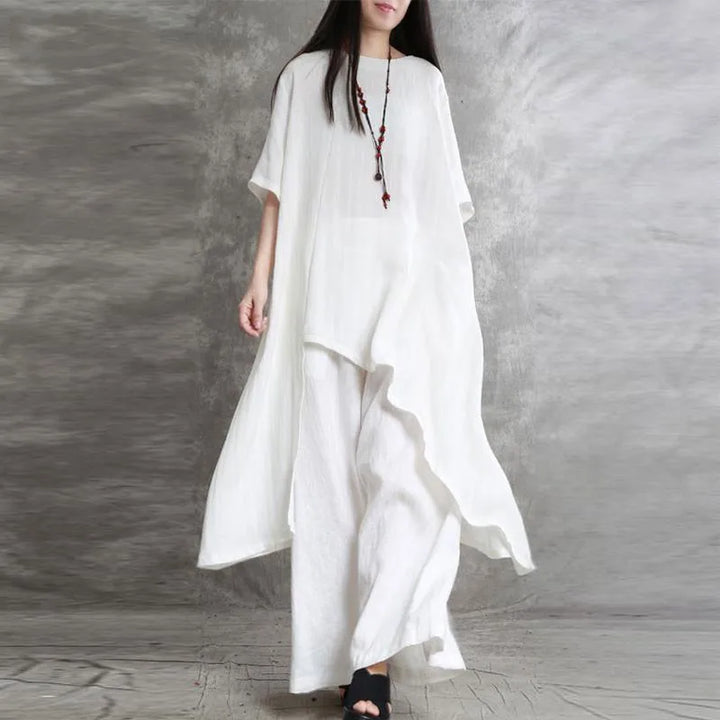 Sabrina | Conjunto de dos piezas: blusa holgada de manga tres cuartos y pantalón de pata ancha con cintura elástica.