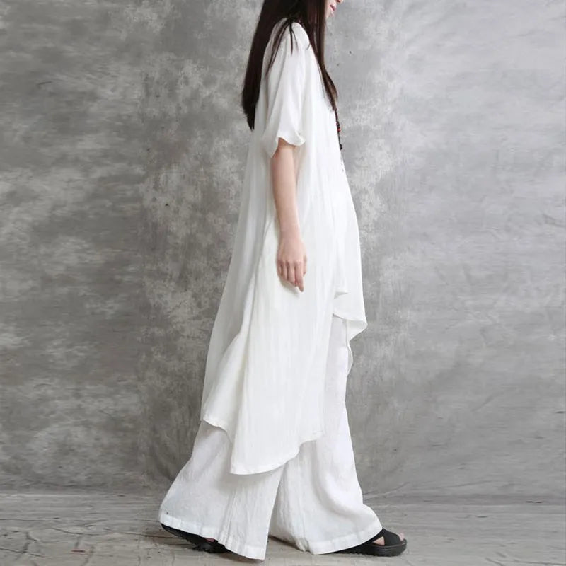 Sabrina | Conjunto de dos piezas: blusa holgada de manga tres cuartos y pantalón de pata ancha con cintura elástica.