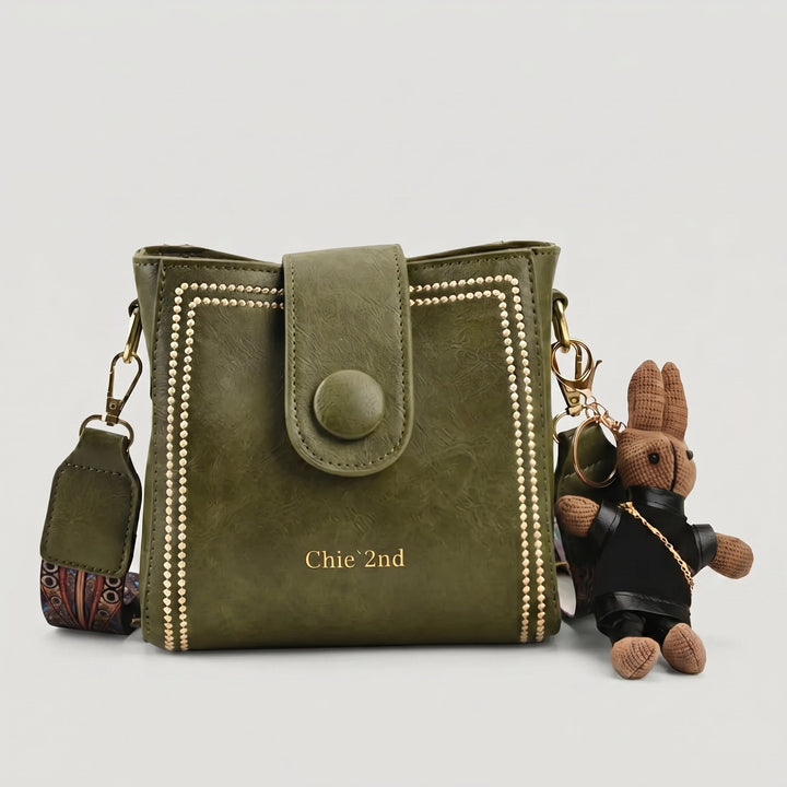 Bolso tipo Satchel + Muñeco Arion de obsequio