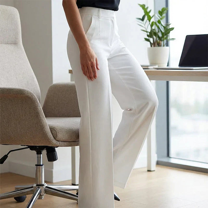 "Emma | Pantalones de tiro alto de corte recto y elegante" (The title is already in Spanish and does not need to be rewritten.)