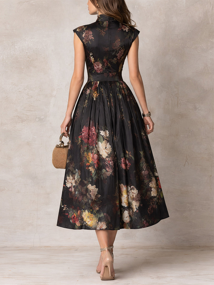 Violetta - Vestido midi negro de satén plisado con estampado floral y cuello con abertura en forma de llave