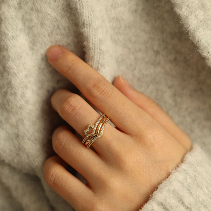 "Anillos Apilables Shining Love Wish Bone" se puede traducir como "Anillos Apilables Shining Love Hueso de Deseo".
