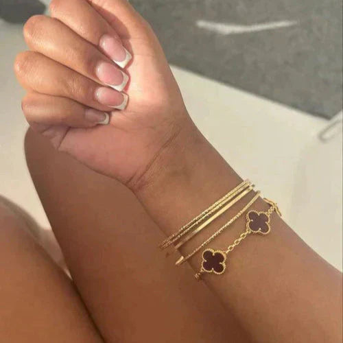 CLOVER | Pulsera Negra y Dorada