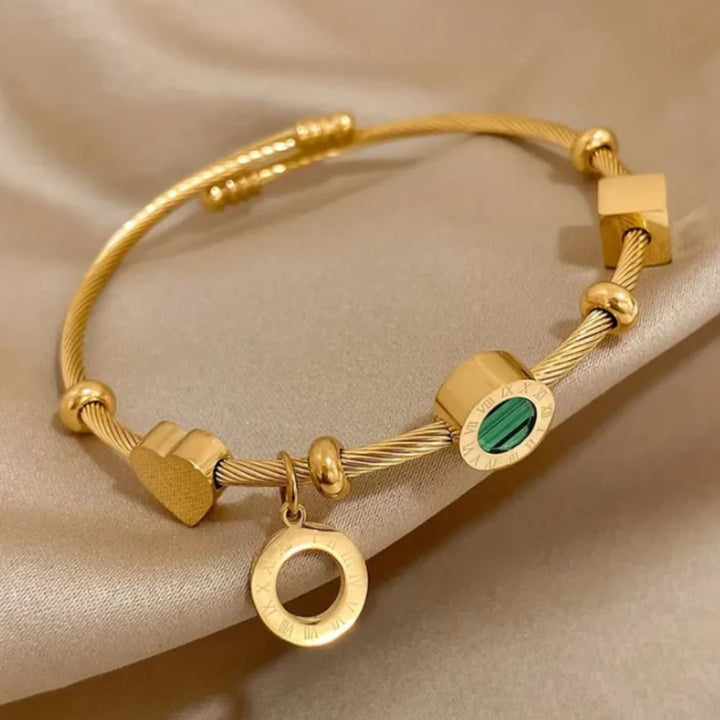 "Pulsera de Oro Emerance" (The title is already in Spanish and does not require translation.)