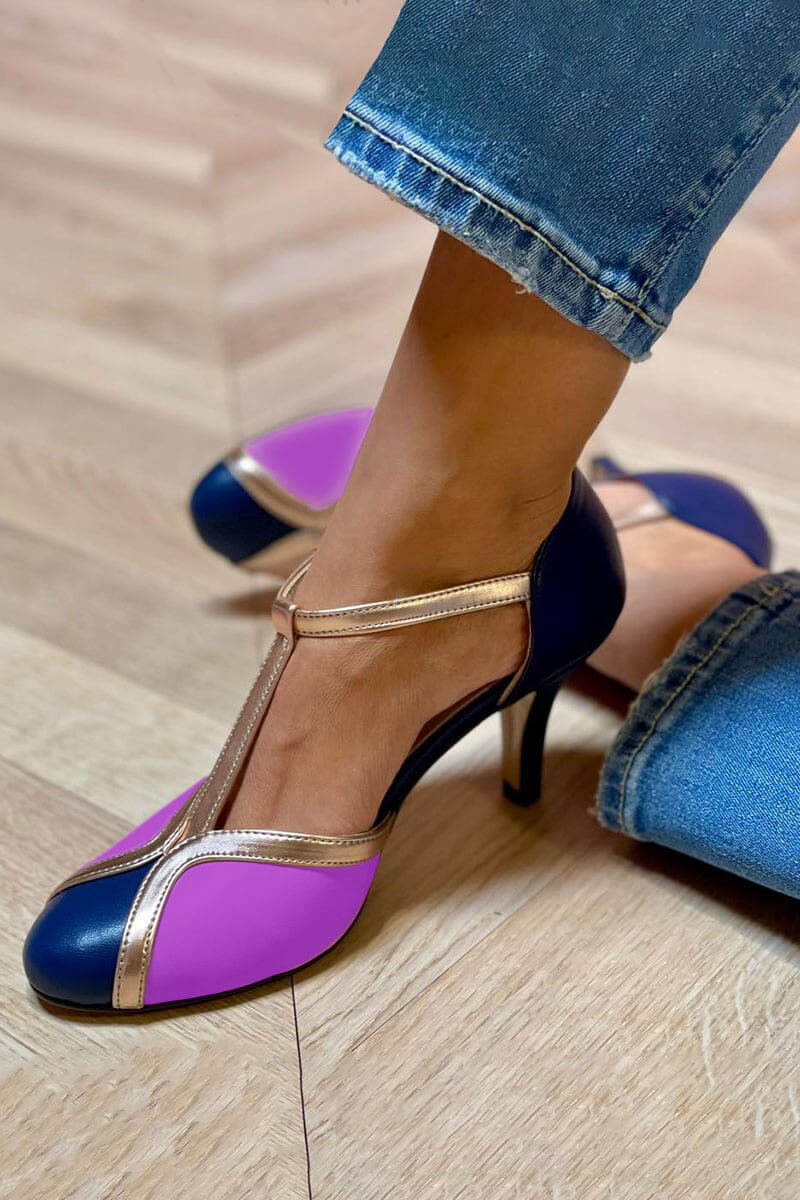 "TACONES RETRO T-BAR" se puede traducir como "TACONES RETRO T-BAR". Sin embargo, si deseas una versión más descriptiva, podrías usar "TACONES RETRO ESTILO T-BAR".