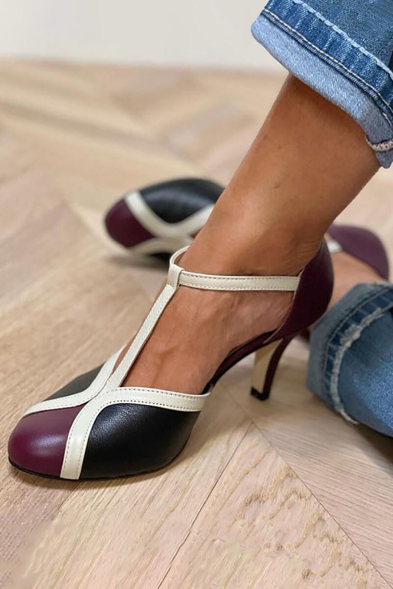 "TACONES RETRO T-BAR" se puede traducir como "TACONES RETRO T-BAR". Sin embargo, si deseas una versión más descriptiva, podrías usar "TACONES RETRO ESTILO T-BAR".