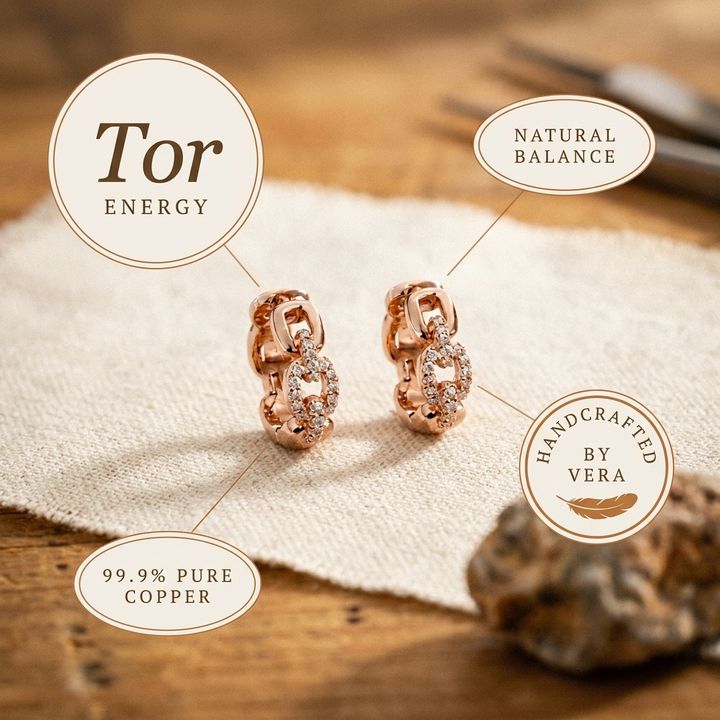 "Pendientes de Cobre Tor de Vera" (The title is already in Spanish, but if you want a slight variation, it could be: "Aretes de Cobre Tor de Vera").