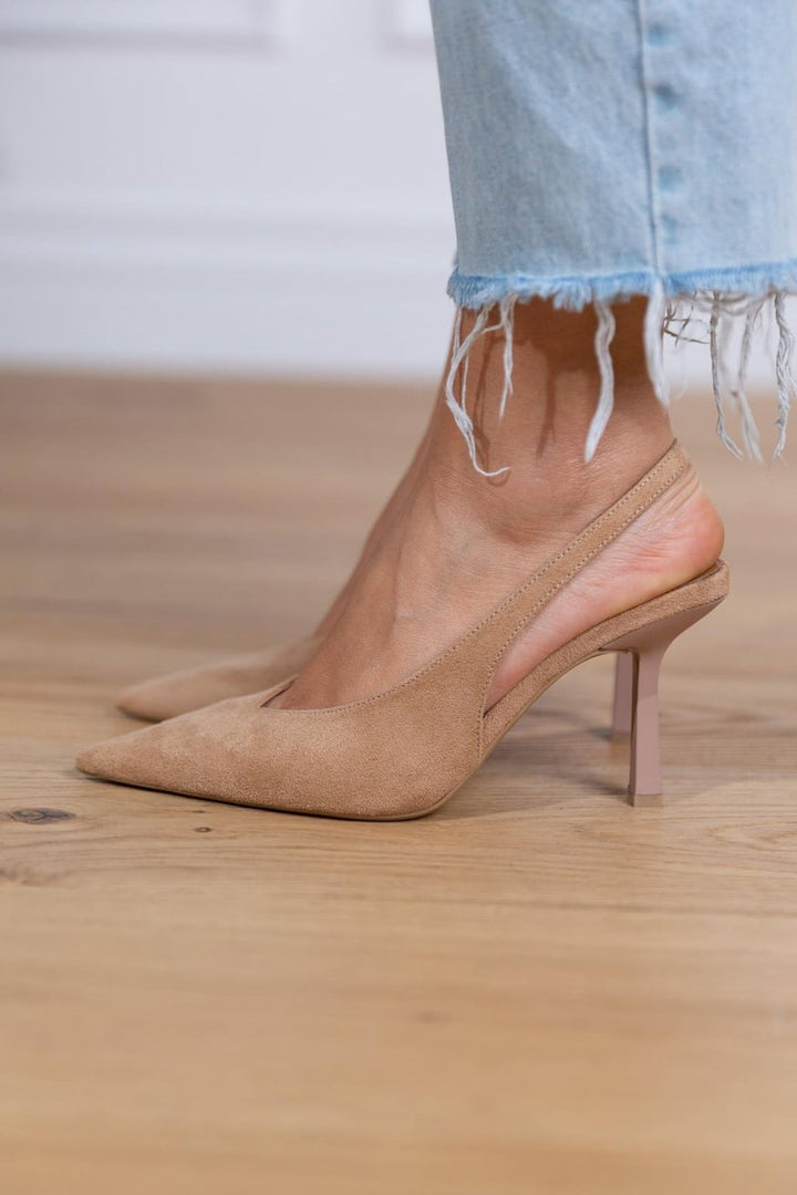 DECOLLETE CON TALÓN DESCUBIERTO